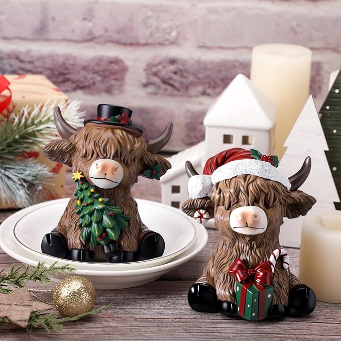 Karenhi 2 Pcs Christmas Highland Cow Decor, 2026 Funny White Elephant Gifts, Resin Highland Cow Figurines Gnomes Scottish Statue Calf with Xmas Tree for Home Garden Kitchen Office Table Decorations