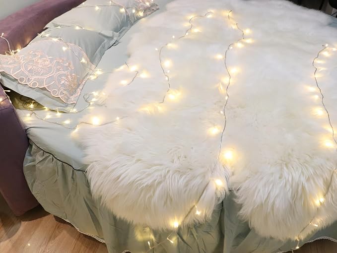 Woolous Sheepskin Rug 4x6 ft, Large Genuine Lambskin Quad Pelt Ivory-White | Genuine New Zealand lambskin quad pelt with fluffy wool. Ideal as sheep skin area rug, fur throw, nursery or bedroom decor.