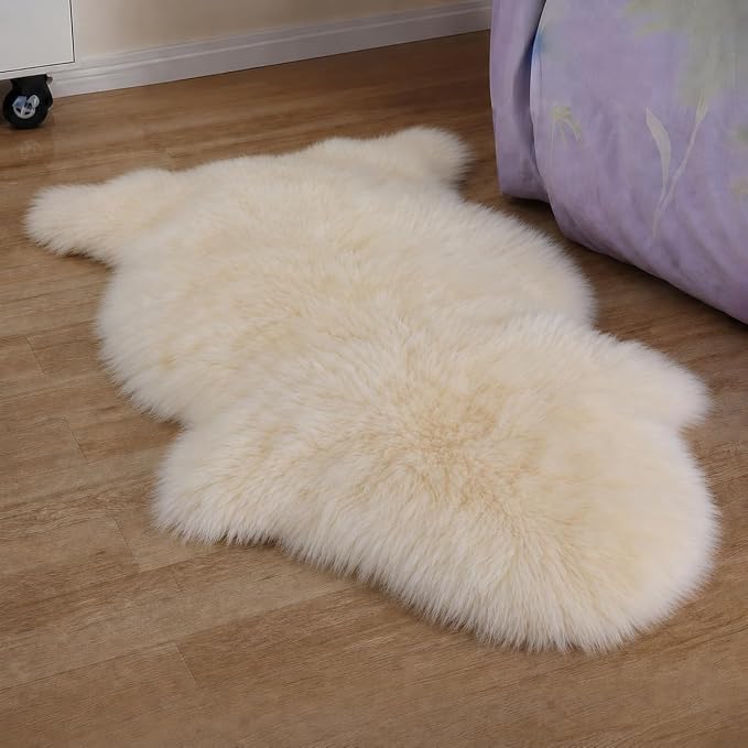 Woolous Sheepskin Rug, Genuine Sheep Skin Chair Throw 2x3 ft Ivory | Natural lambskin pelt with fluffy wool texture. Ideal as area rug, chair throw, bedroom or living room decor.