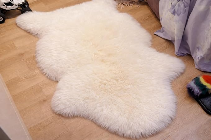 Woolous Sheepskin Rug, Large Genuine Sheep Skin Pelt 3.5x2.3 ft Ivory-White | Genuine New Zealand sheepskin with extra thick fluffy wool. Use as area rug, chair throw, sofa cover or bedroom decor.