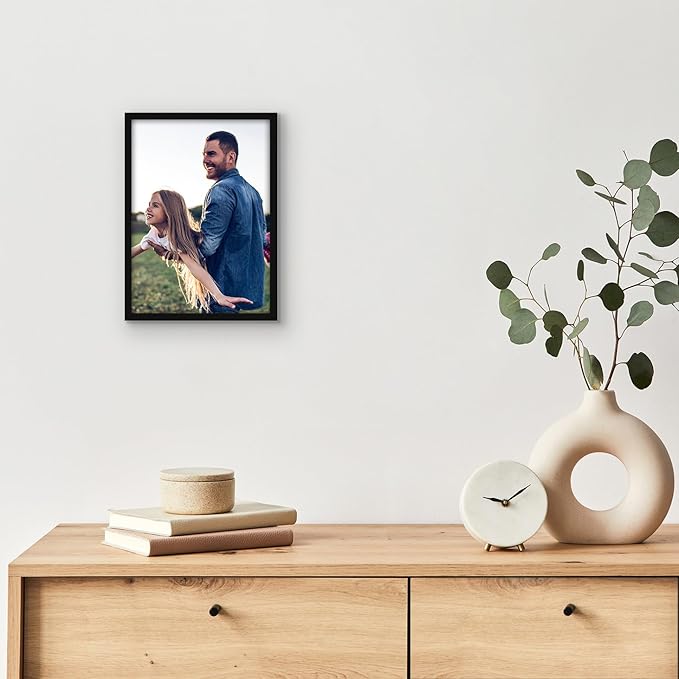 Americanflat 5x7 Picture Frame with Shatter-Resistant Glass - Streamline Collection - Thin Border Photo Frame for Tabletop and Wall Display - Hanging Hardware and Easel Stand Included - Black