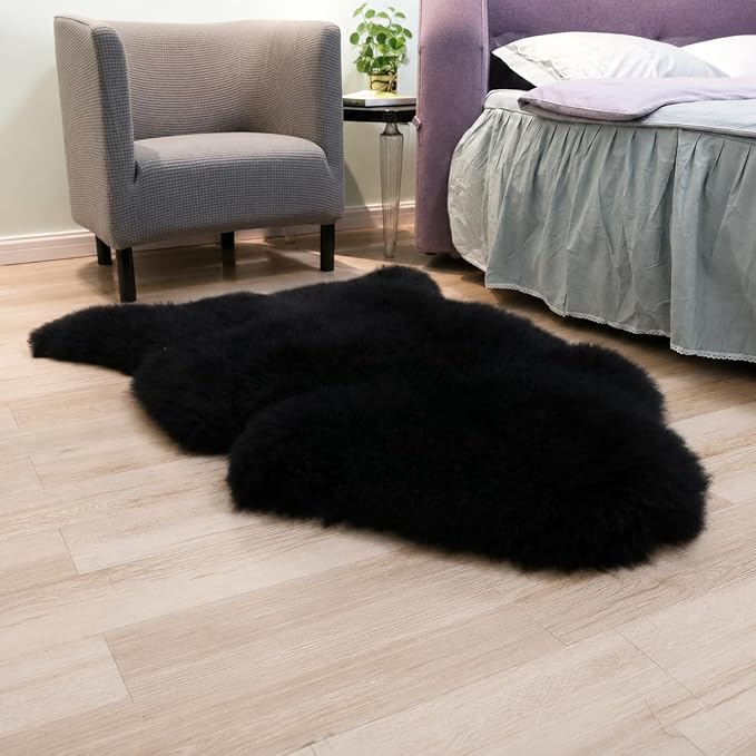 Woolous Black Sheepskin Rug Genuine New Zealand Lambskin Single Pelt 2x3 ft | Real New Zealand lambskin wool with soft fluffy texture. Use as sheep skin rug, chair throw, sofa cover or bedroom decor.
