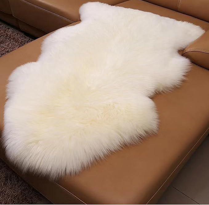 Woolous Sheepskin Rug, Large Genuine Sheep Skin Pelt 3.5x2.3 ft Ivory-White | Genuine New Zealand sheepskin with extra thick fluffy wool. Use as area rug, chair throw, sofa cover or bedroom decor.