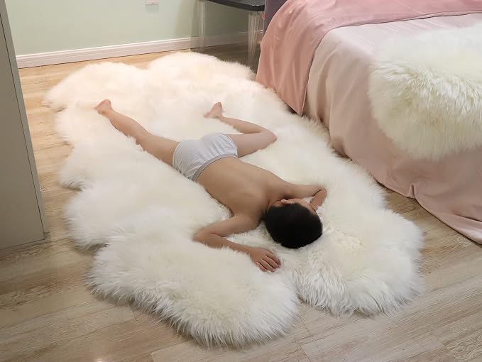 Woolous Sheepskin Rug 4x6 ft, Large Genuine Lambskin Quad Pelt Ivory-White | Genuine New Zealand lambskin quad pelt with fluffy wool. Ideal as sheep skin area rug, fur throw, nursery or bedroom decor.