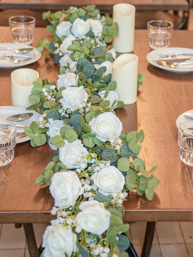 6FT Artificial Eucalyptus Garland with Flowers, 10 White Roses Baby Breath Garland Floral Greenery for Wedding Party Centerpiece Table Runner Backdrop Wall Decor Decoration