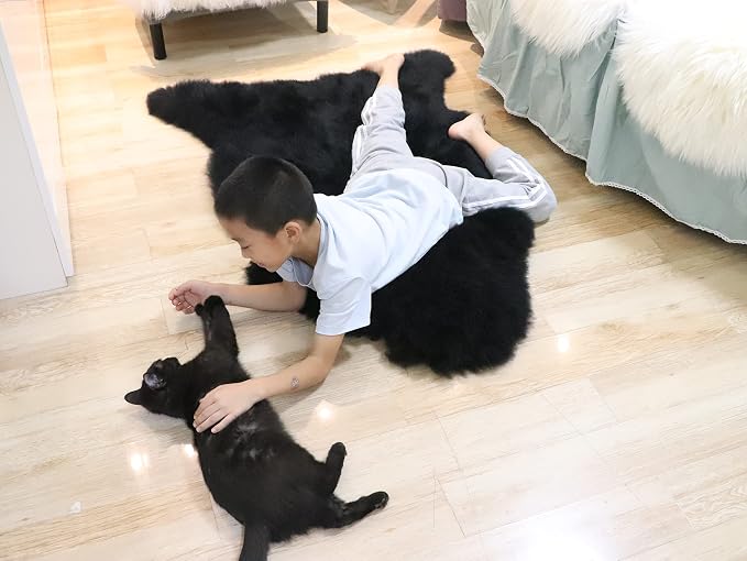 Woolous Black Sheepskin Rug Genuine New Zealand Lambskin Single Pelt 2x3 ft | Real New Zealand lambskin wool with soft fluffy texture. Use as sheep skin rug, chair throw, sofa cover or bedroom decor.